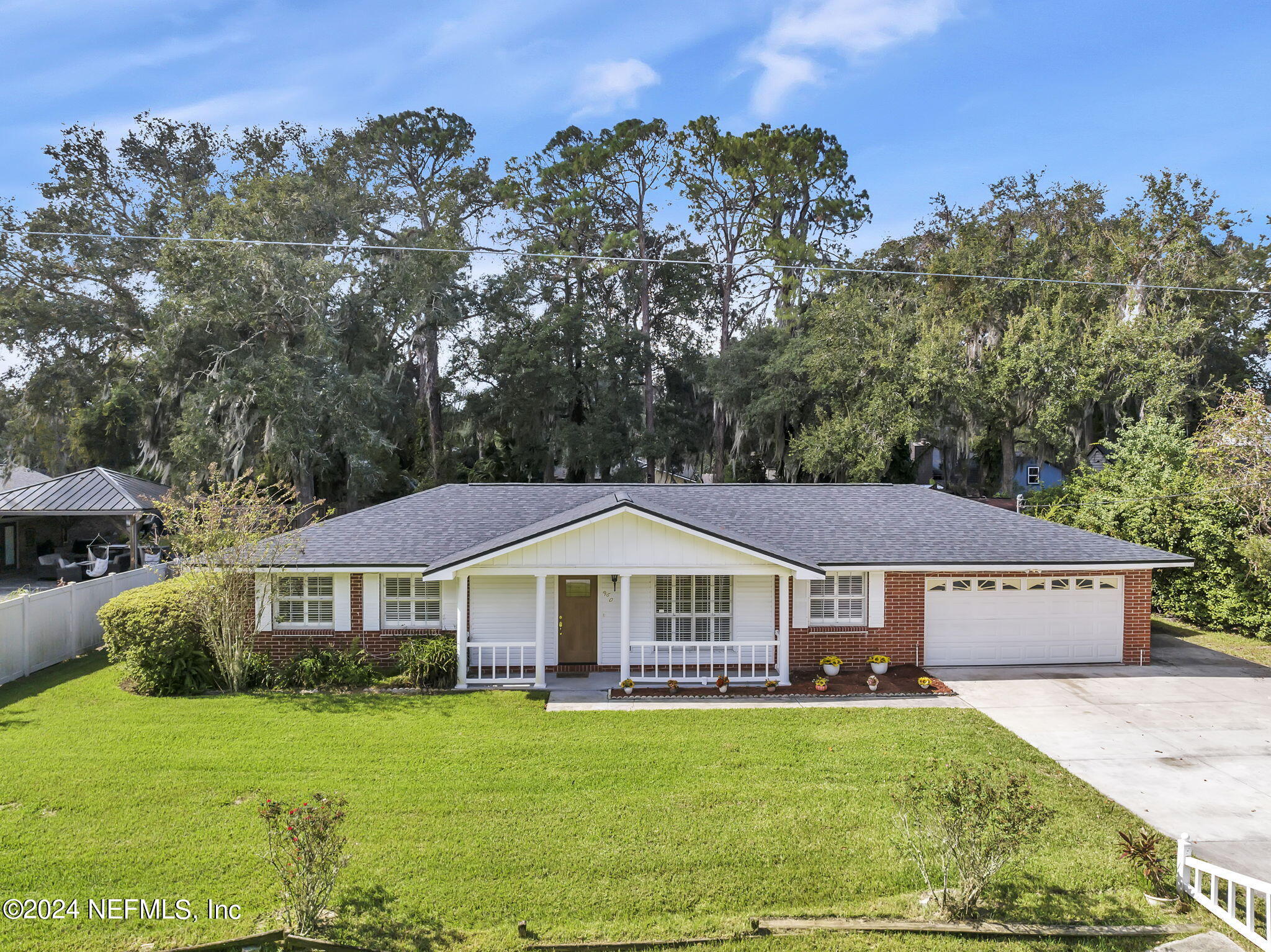 960 Grape Lane St. Johns, FL 32259 - Photo 37 of 46 a front view of a house with yard porch and furniture
