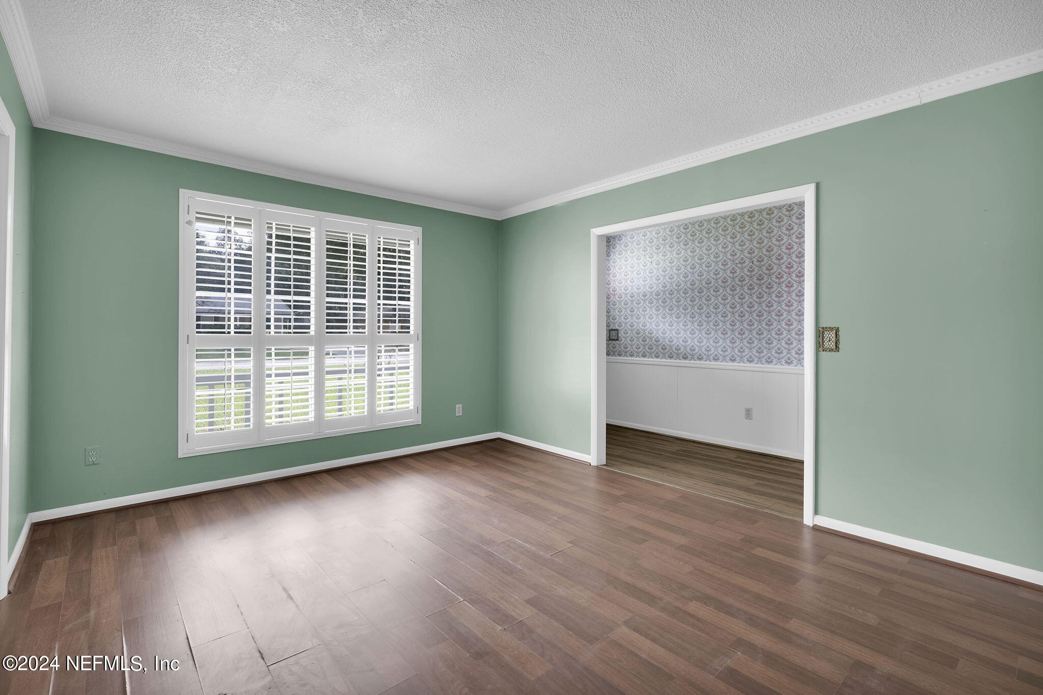 960 Grape Lane St. Johns, FL 32259 - Photo 6 of 46 an empty room with wooden floor and windows