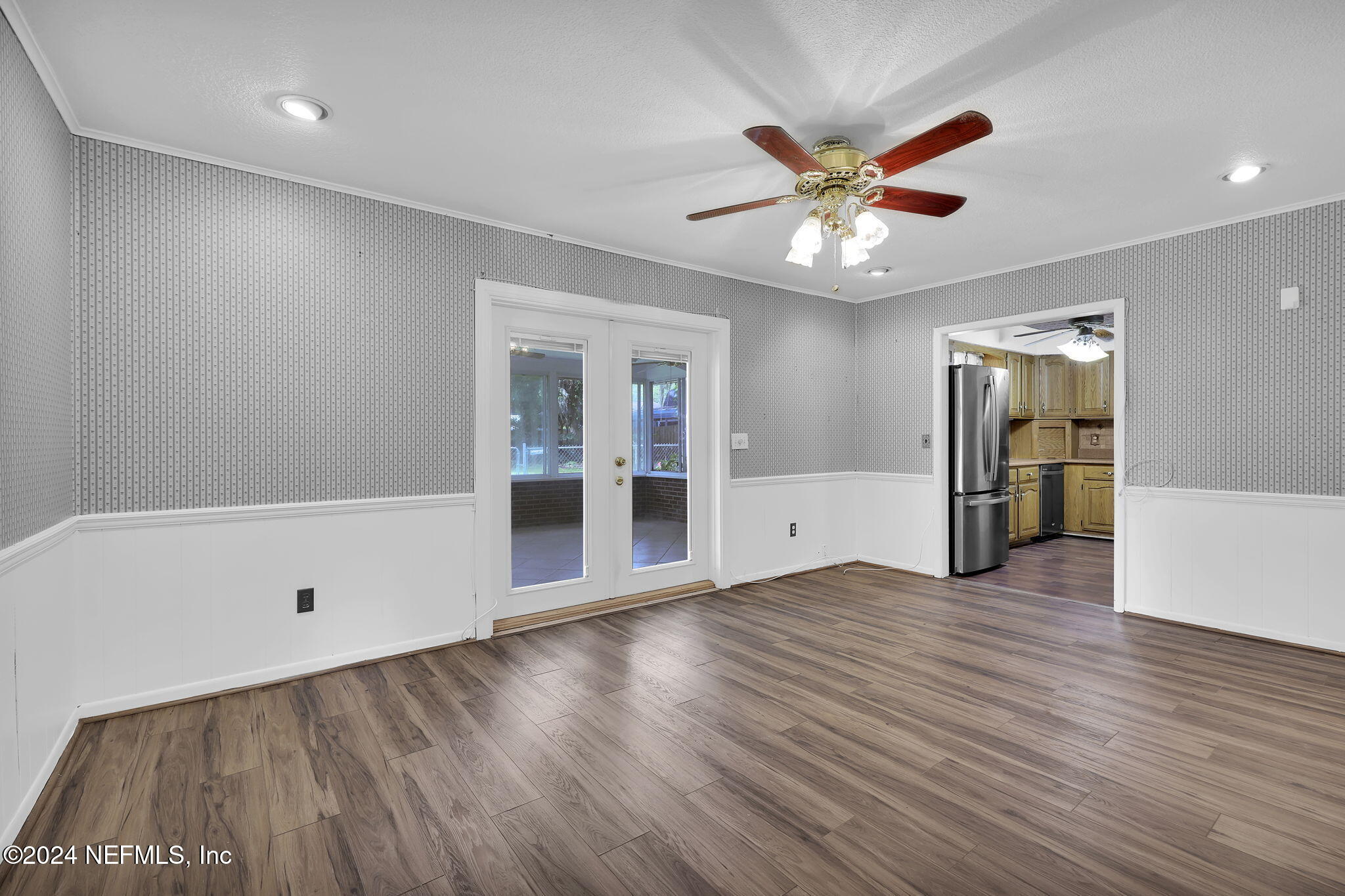 960 Grape Lane St. Johns, FL 32259 - Photo 10 of 46 wooden floor in an empty room with a window