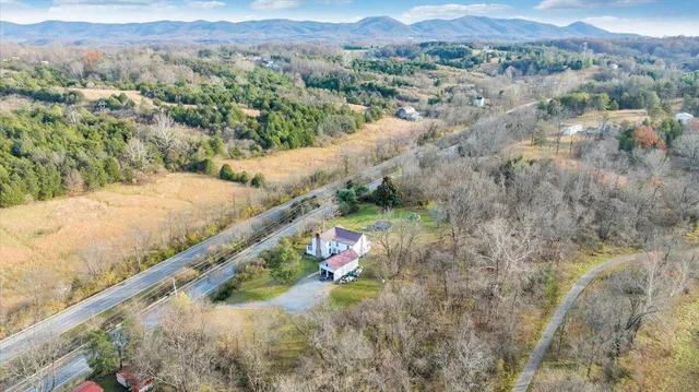 a view of a yard with a mountain