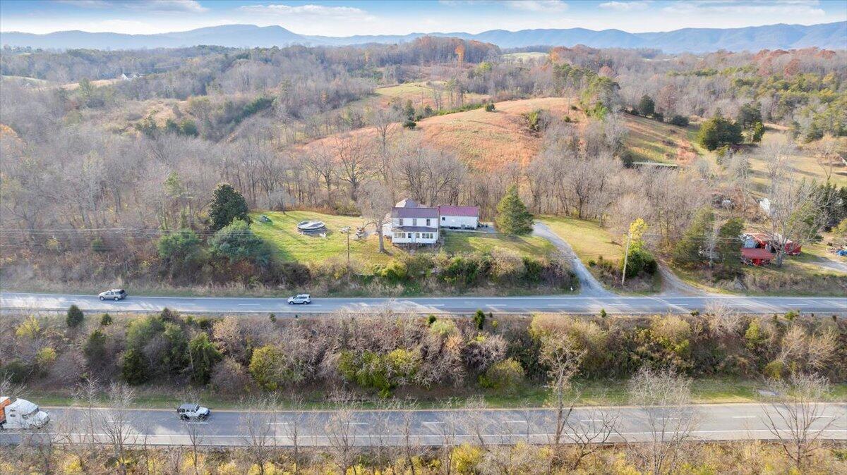 6457 Roanoke Road Fincastle, VA 24090 - Photo 2 of 34 a view of a town with big trees