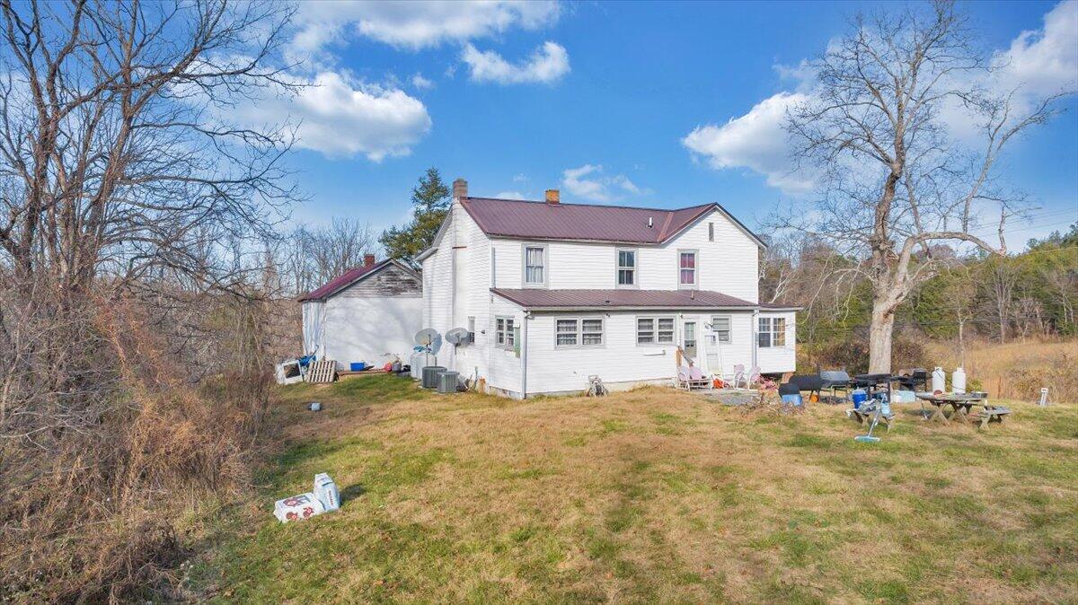 6457 Roanoke Road Fincastle, VA 24090 - Photo 21 of 34 a view of residential houses with yard and tree s