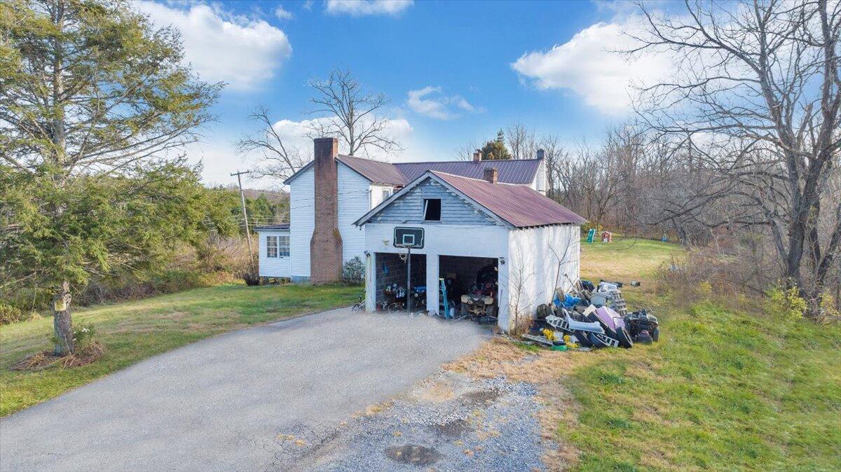 6457 Roanoke Road Fincastle, VA 24090 - Photo 24 of 34 a view of a house with a yard and pathway