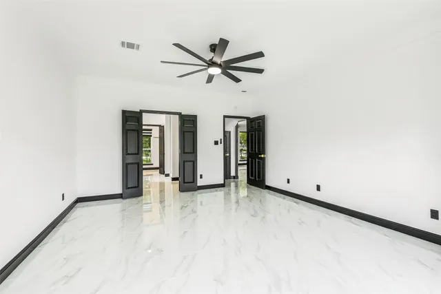 a kitchen with a refrigerator and a sink