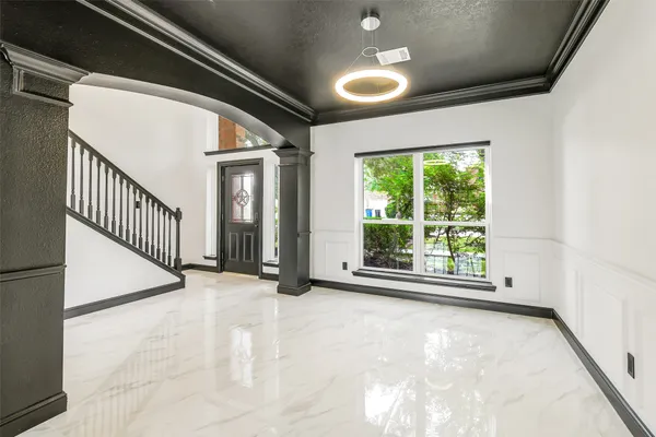 a view of an empty room with a window