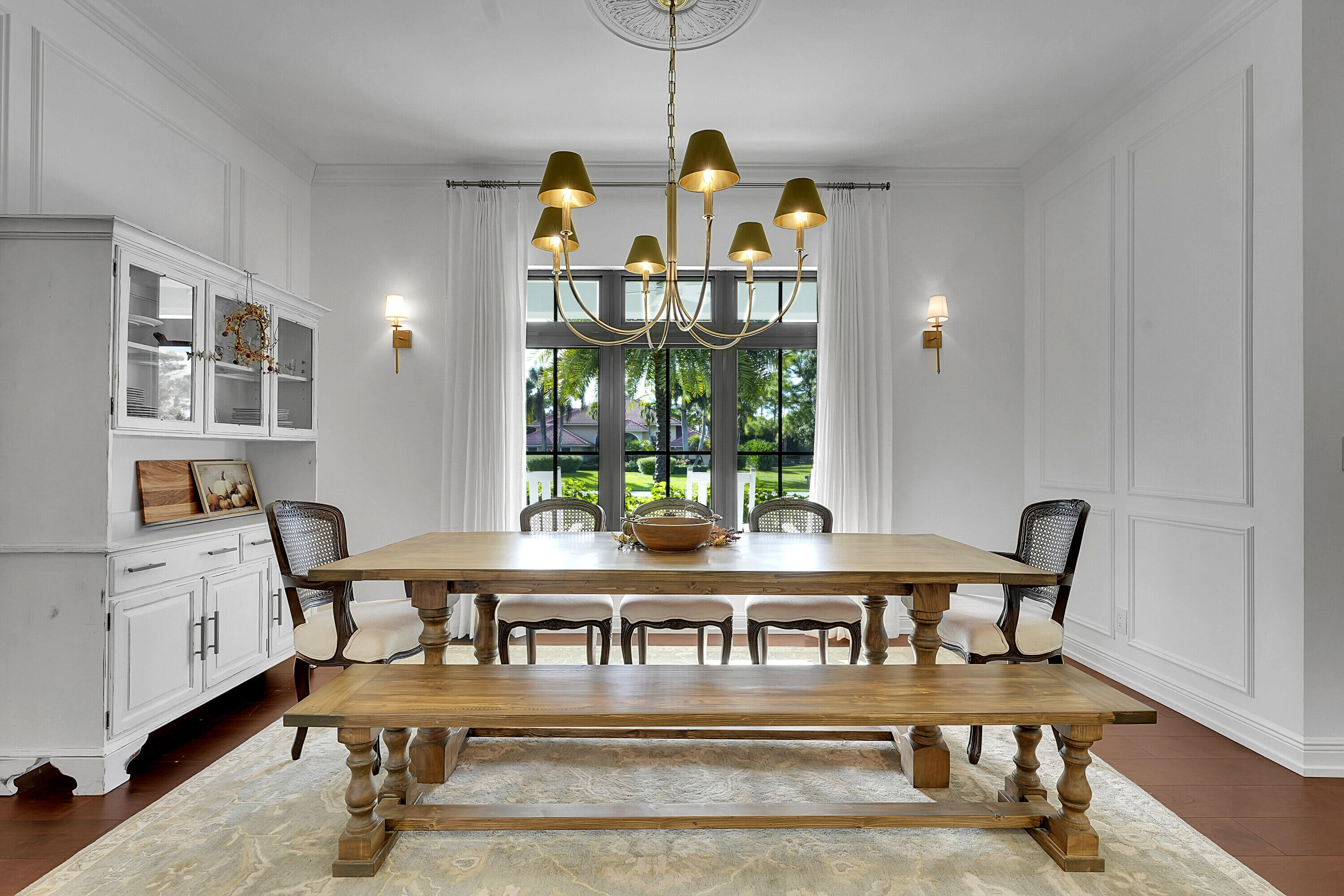 7660 Bold Lad Road Palm Beach Gardens, FL 33418 - Photo 13 of 68 a view of a dining room with furniture and window