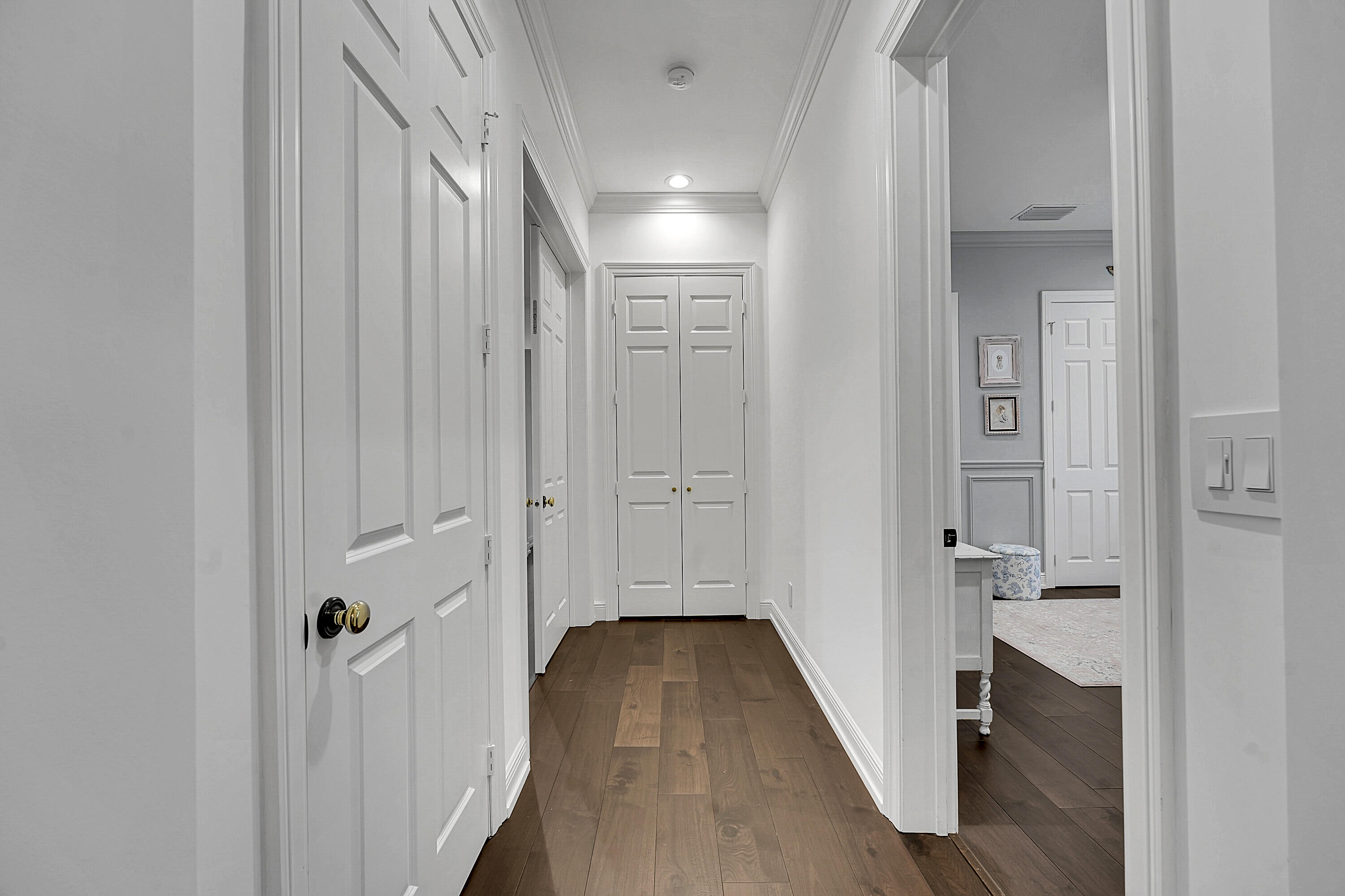 7660 Bold Lad Road Palm Beach Gardens, FL 33418 - Photo 24 of 68 a view of a hallway with wooden floor and staircase