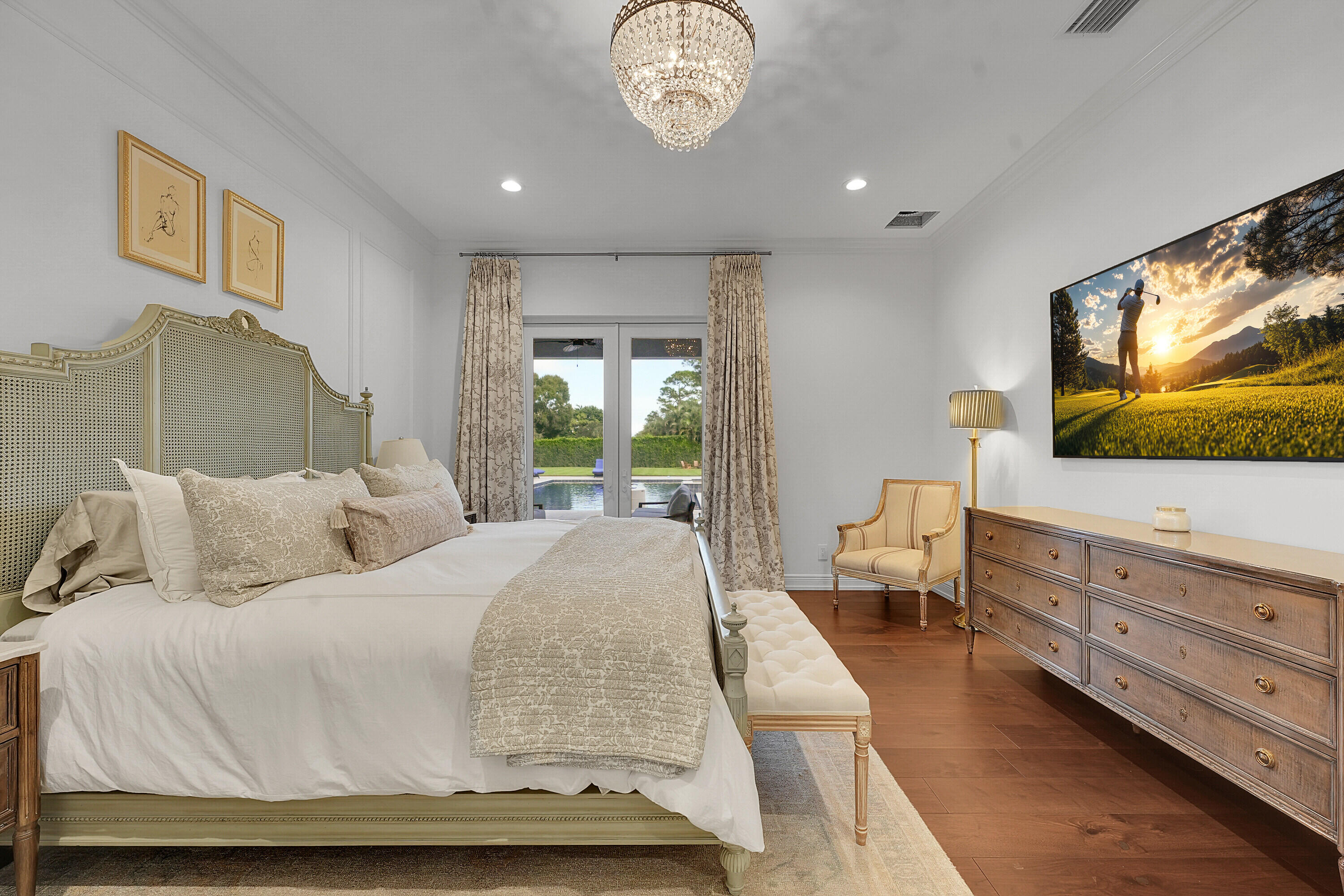 7660 Bold Lad Road Palm Beach Gardens, FL 33418 - Photo 26 of 68 a bedroom with a bed and a flat screen tv