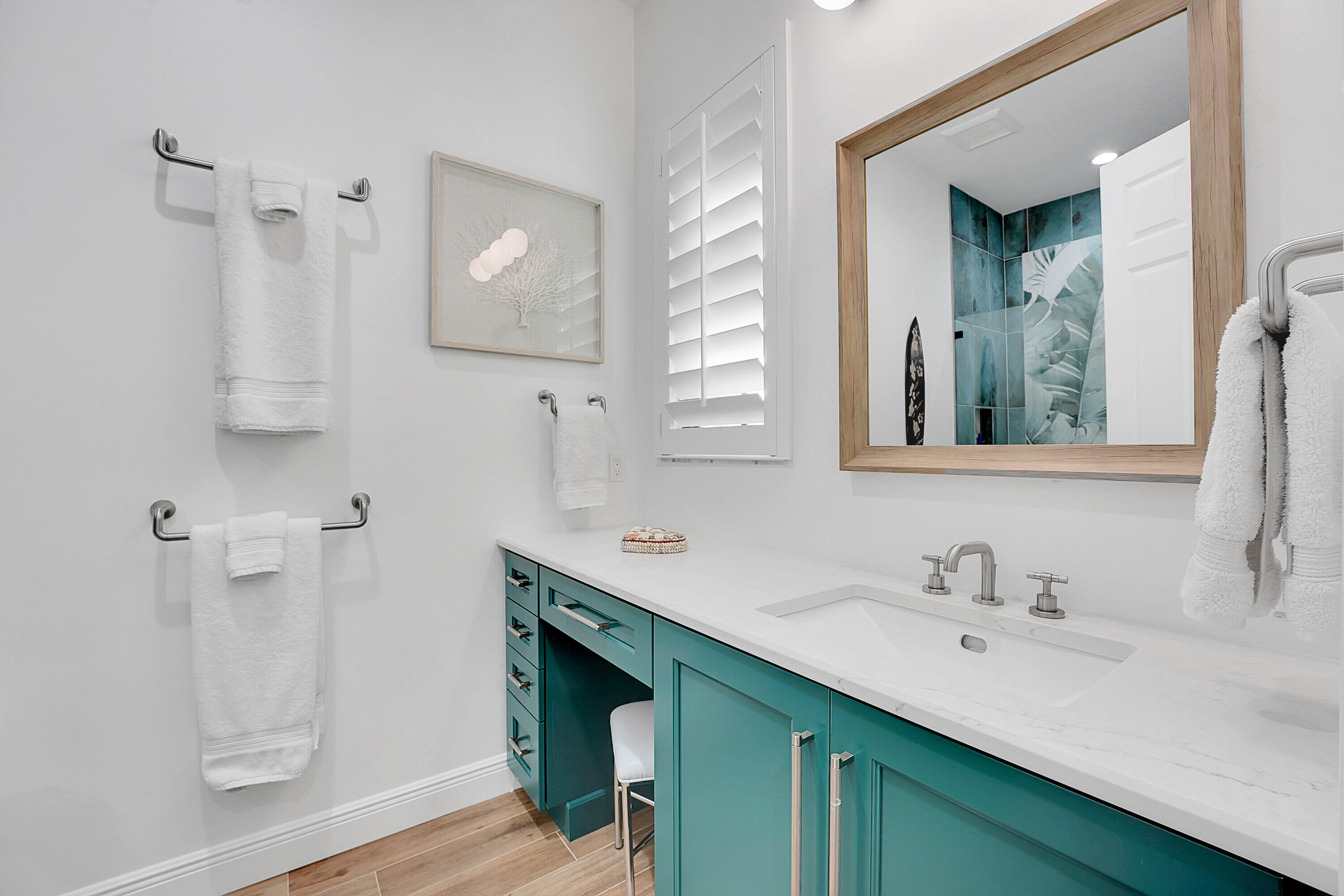 7660 Bold Lad Road Palm Beach Gardens, FL 33418 - Photo 33 of 68 a bathroom with a sink and a mirror