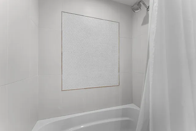 a bathroom with a bathtub