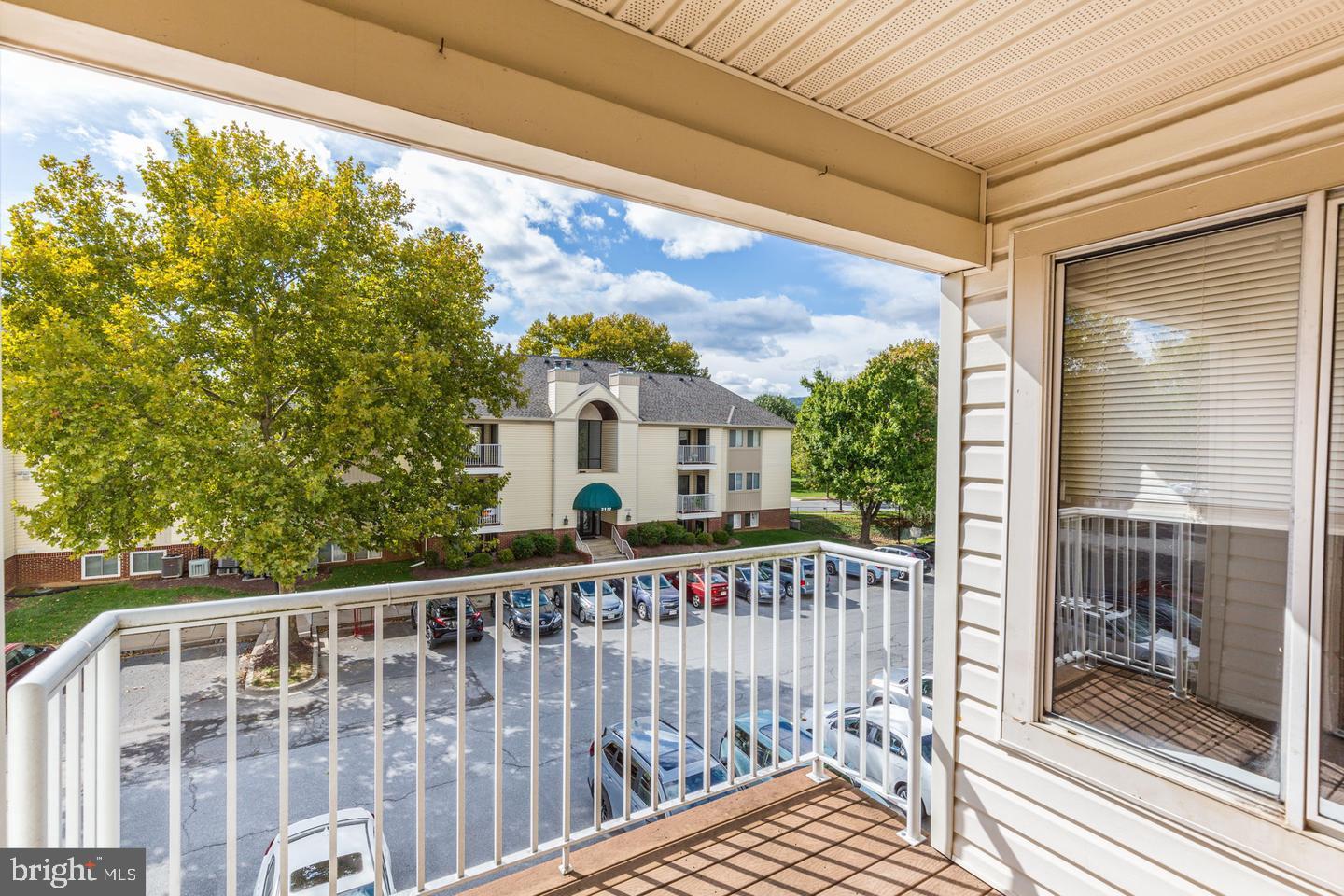 2106 Whitehall Road, Unit 2D Frederick, MD 21702 - Photo 11 of 33 a view of a two chairs and table in the balcony