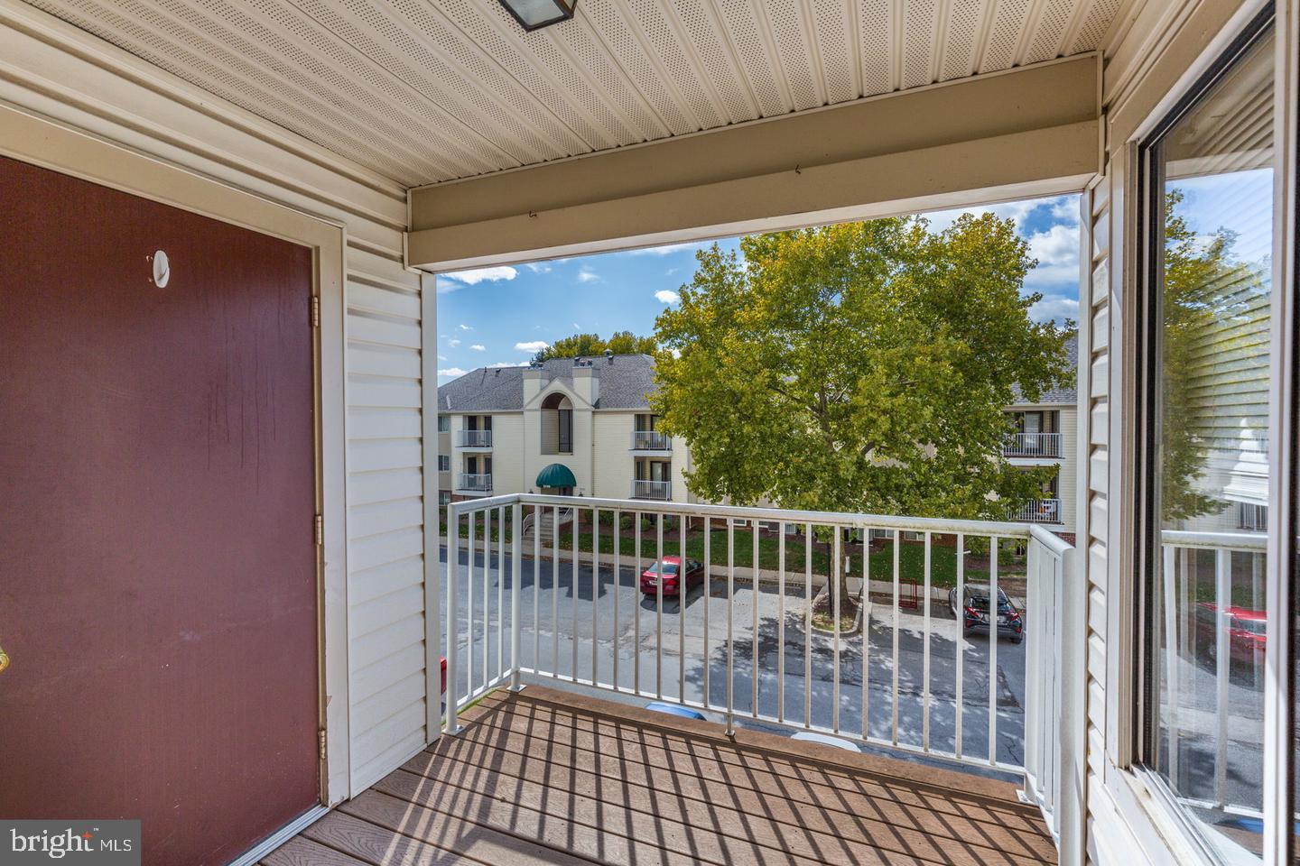 2106 Whitehall Road, Unit 2D Frederick, MD 21702 - Photo 12 of 33 a view of balcony with wooden floor