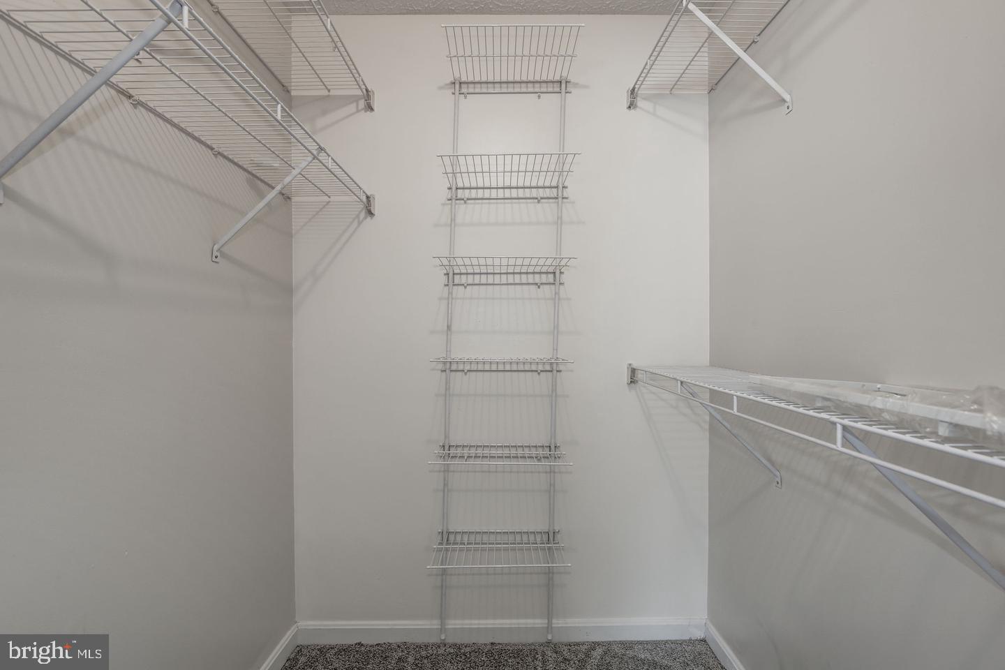 2106 Whitehall Road, Unit 2D Frederick, MD 21702 - Photo 23 of 33 a view of walk in closet with empty racks