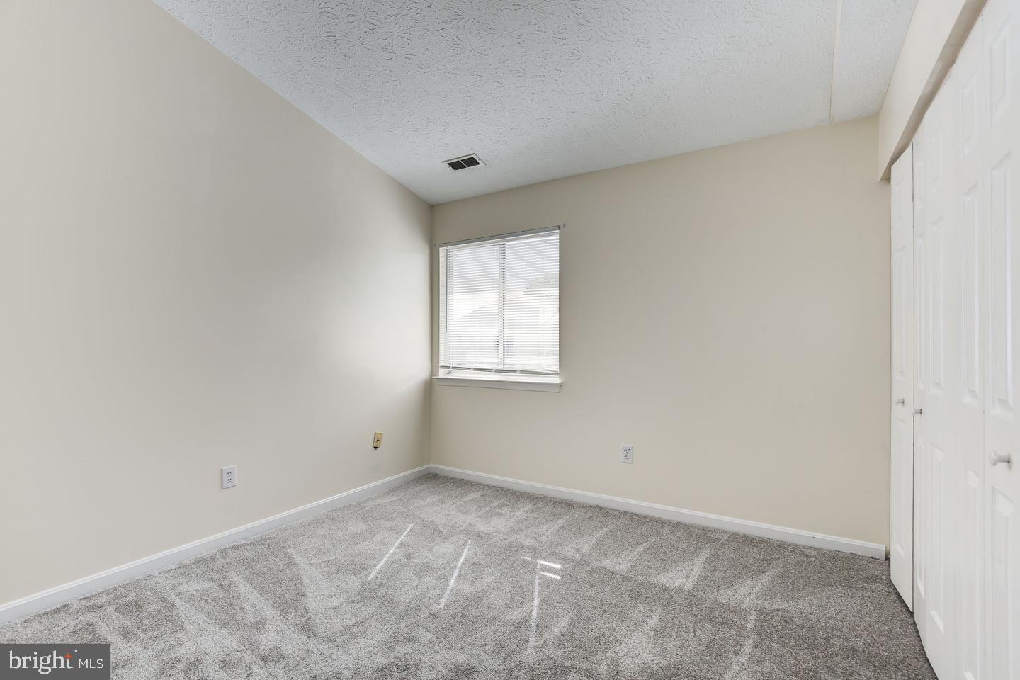 2106 Whitehall Road, Unit 2D Frederick, MD 21702 - Photo 26 of 33 an empty room with a window