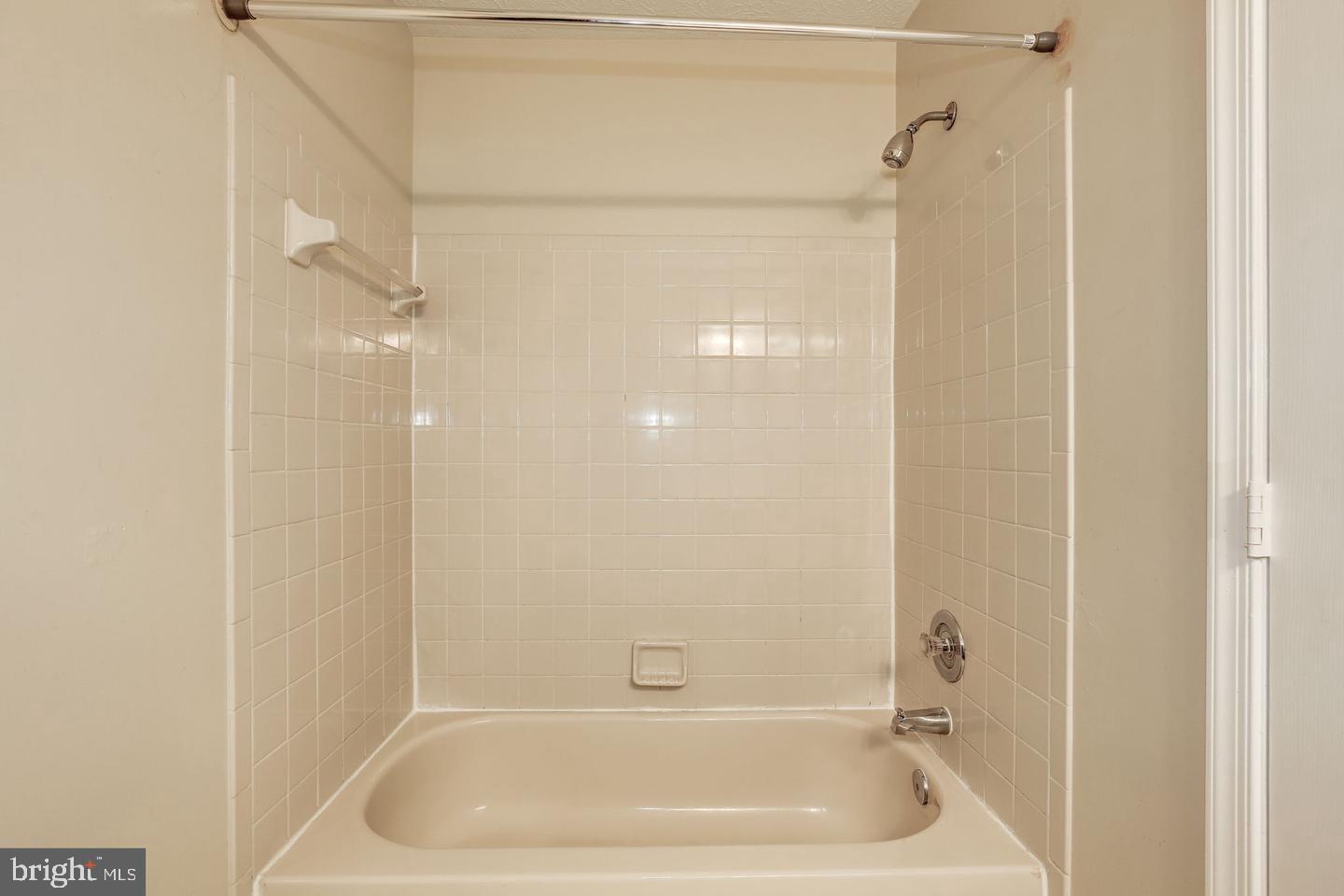 2106 Whitehall Road, Unit 2D Frederick, MD 21702 - Photo 33 of 33 a bathroom with a tub