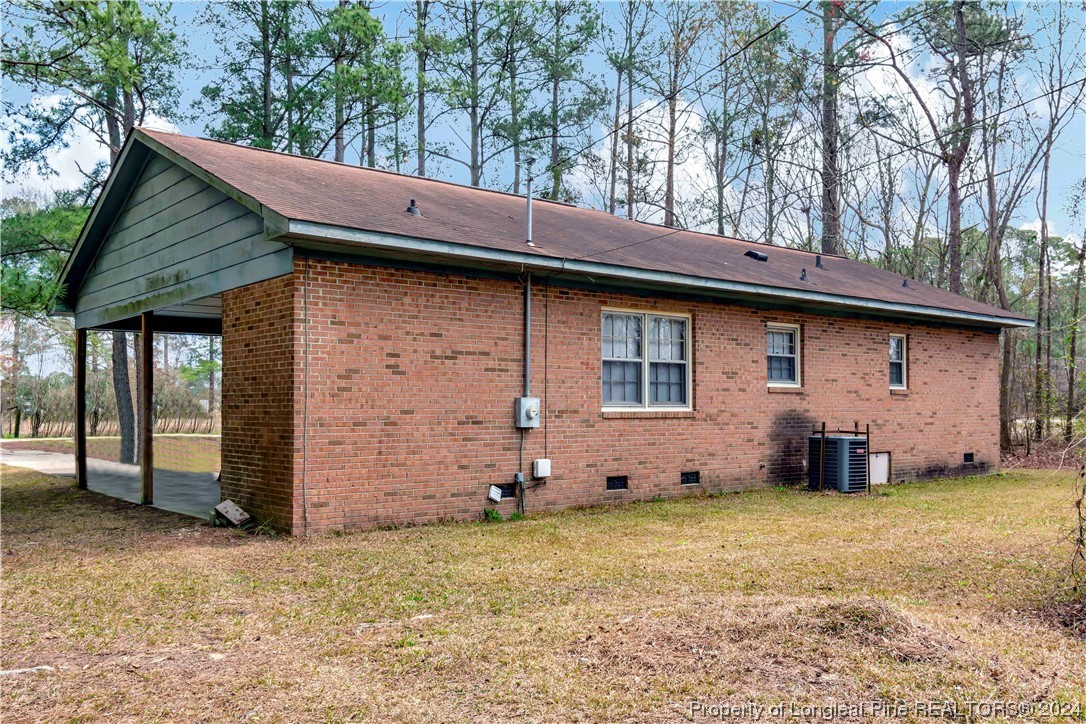 527 Old Allenton Road Lumberton, NC 28358 - Photo 18 of 20 a house with trees in the background
