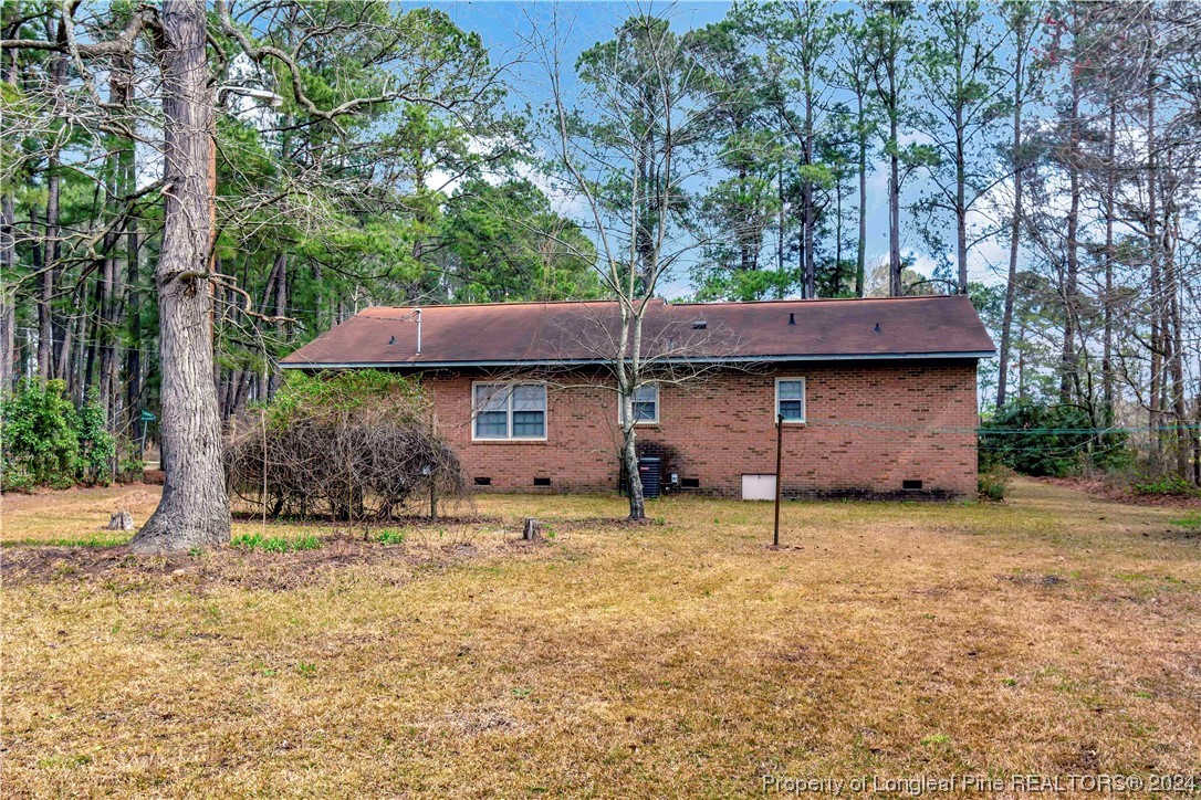 527 Old Allenton Road Lumberton, NC 28358 - Photo 19 of 20 a view of a house with a yard and large tree