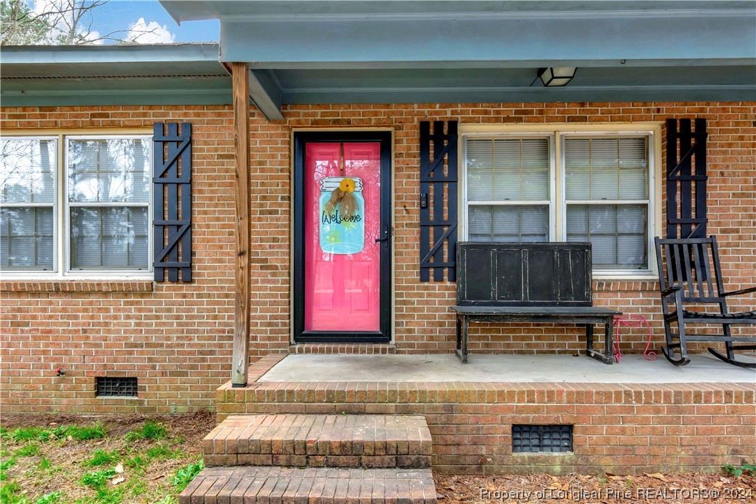 527 Old Allenton Road Lumberton, NC 28358 - Photo 3 of 20 a front view of a house with a yard