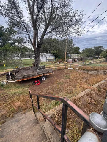 a media room with lots of chairs and a projector screen