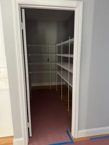 a view of a wooden closet