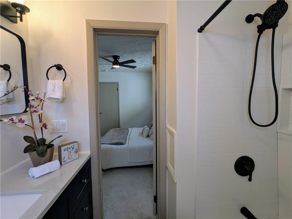 310 East Penn Street Butler, PA 16001 - Photo 16 of 30 a bathroom with a sink and mirror