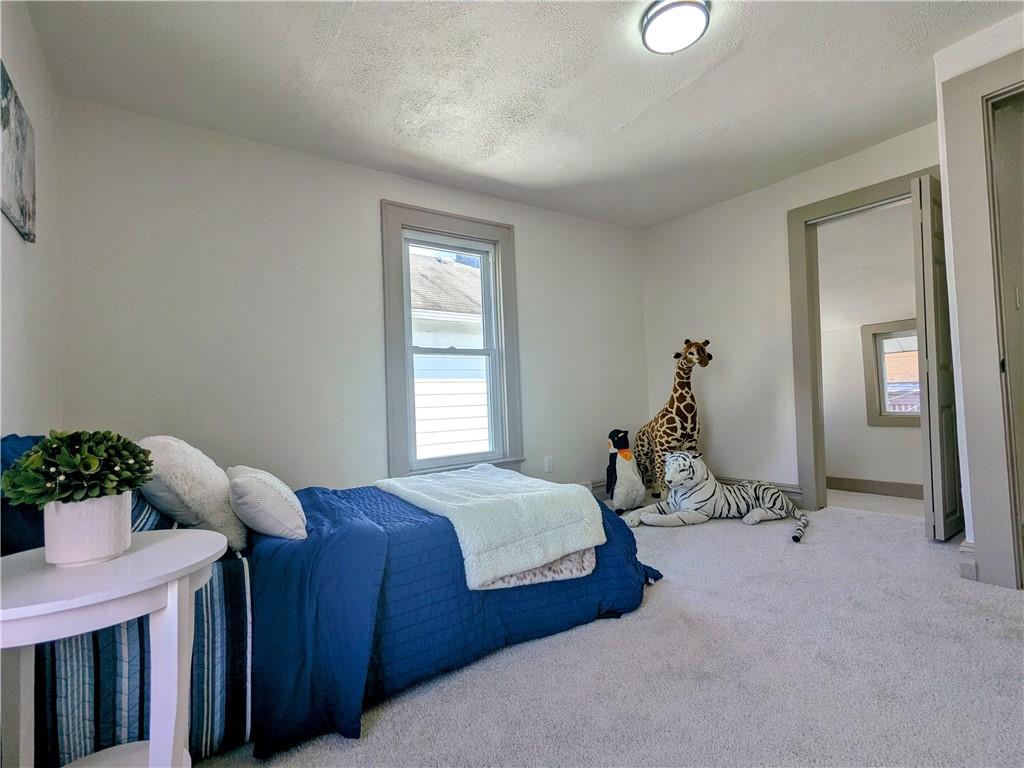 310 East Penn Street Butler, PA 16001 - Photo 17 of 30 a bedroom with bed and a window