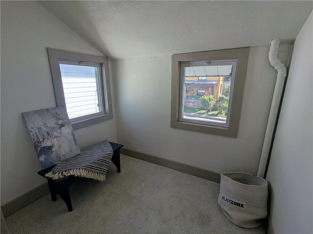 310 East Penn Street Butler, PA 16001 - Photo 18 of 30 a living room with furniture and a window
