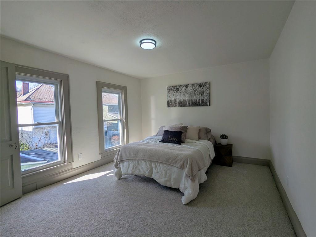 310 East Penn Street Butler, PA 16001 - Photo 19 of 30 a bedroom with a bed and window