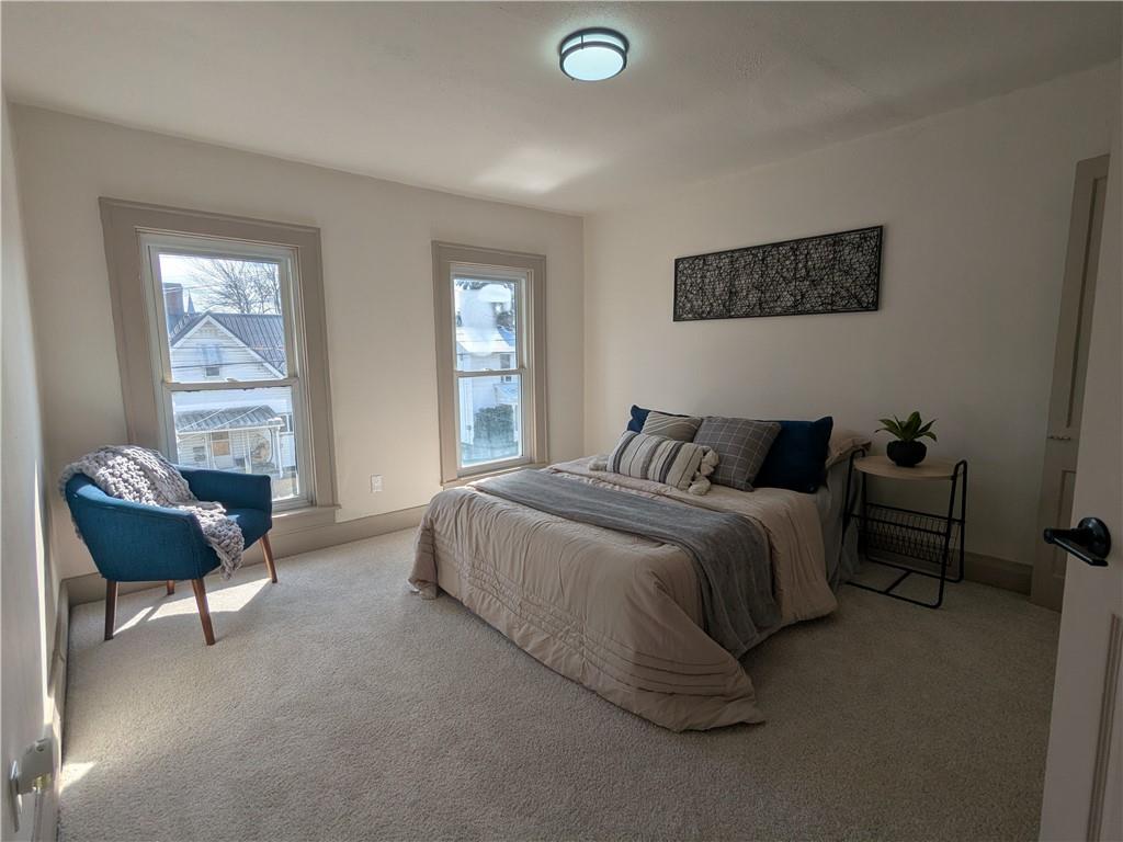 310 East Penn Street Butler, PA 16001 - Photo 22 of 30 a bedroom with bed chair and window