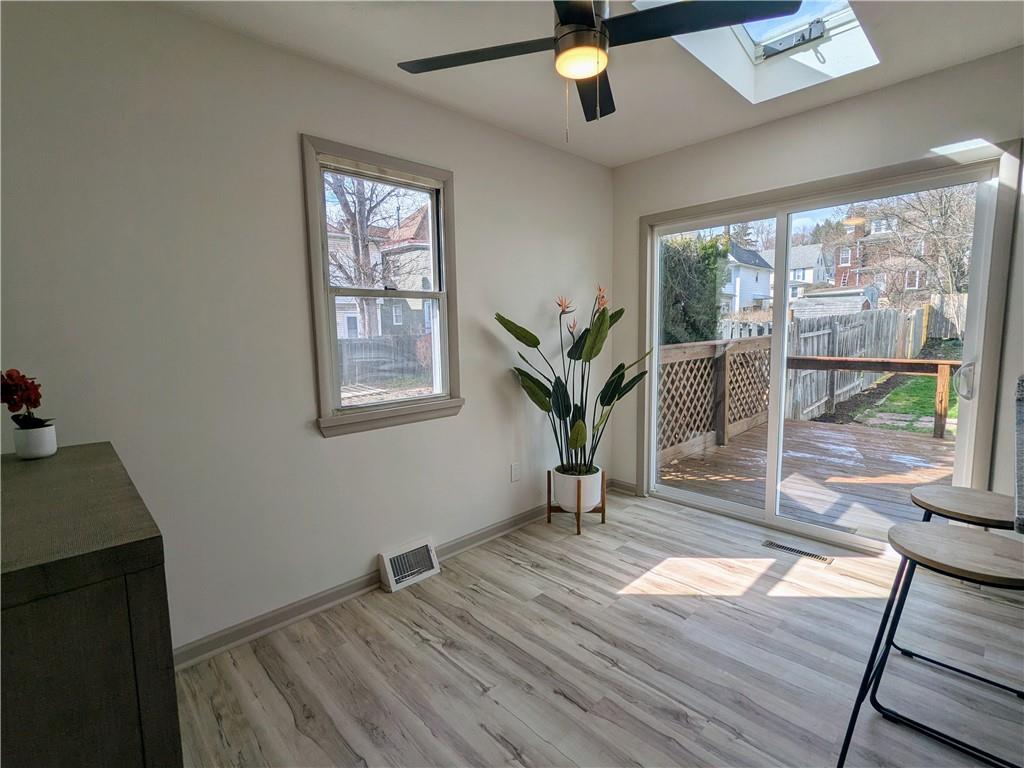 310 East Penn Street Butler, PA 16001 - Photo 10 of 30 a living room with wooden floor and a window