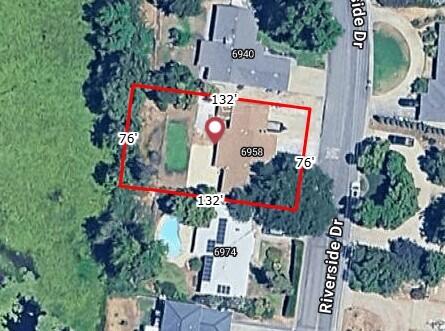 6958 Riverside Drive Redding, CA 96001 - Photo 30 of 30 an aerial view of a house