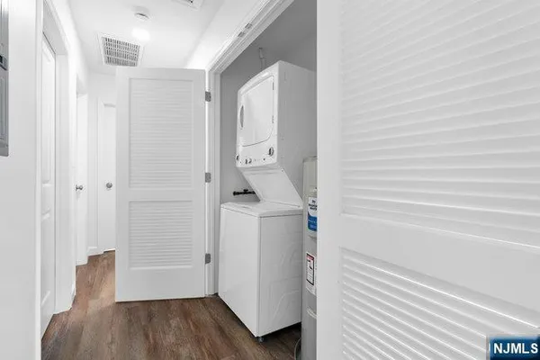a bathroom with a sink and shower