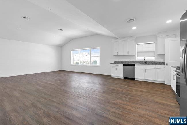 2 Rossi Court, Unit 2 South Hackensack, NJ 07606 - Photo 5 of 20 a view of kitchen with sink wooden floor and window