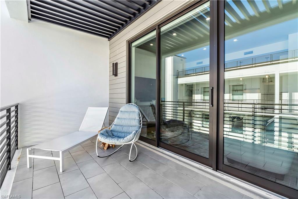 850 Central Avenue, Unit 310 Naples, FL 34102 - Photo 15 of 21 a outdoor view with a sitting space