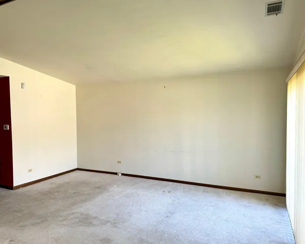 a kitchen with stainless steel appliances a stove a sink and cabinets