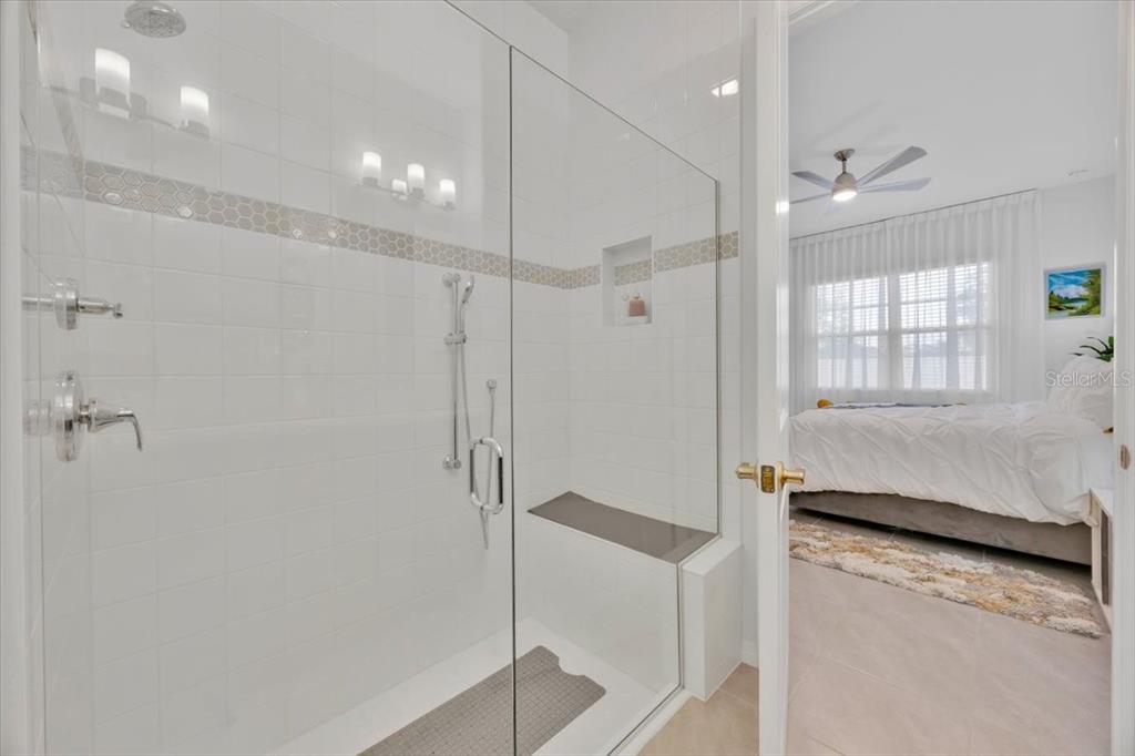 2031 Key Bay Trail Kissimmee, FL 34747 - Photo 17 of 46 a bathroom with a shower and a sink