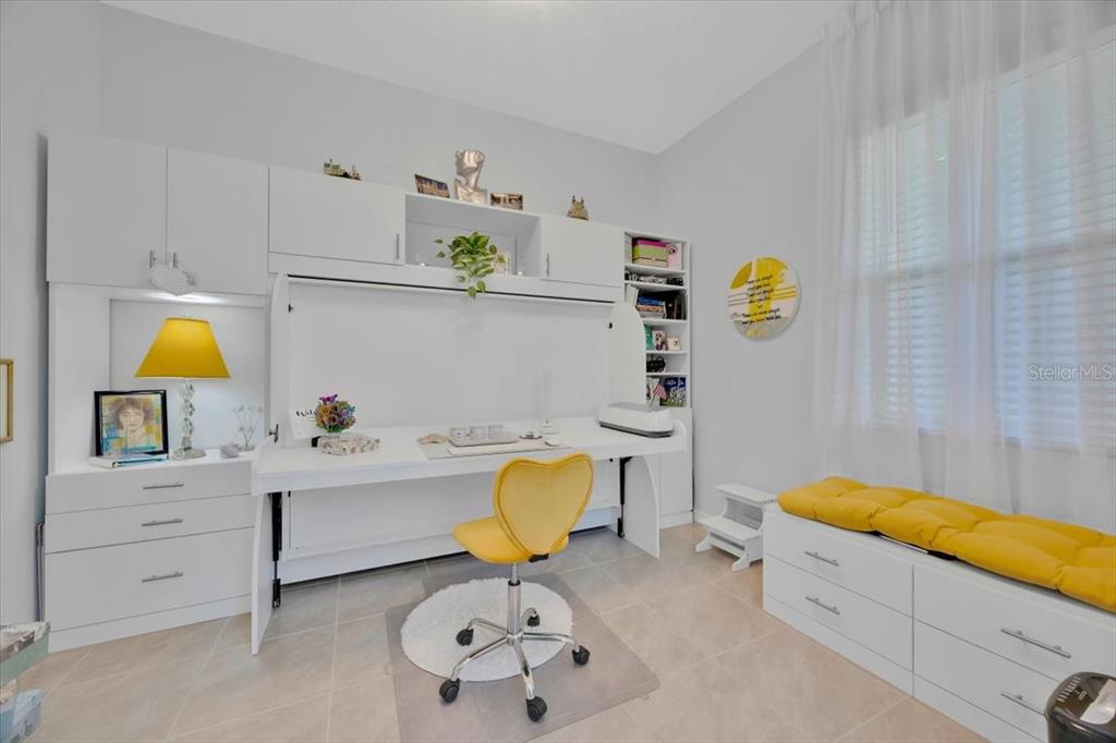 2031 Key Bay Trail Kissimmee, FL 34747 - Photo 21 of 46 a bathroom with a tub sink and mirror