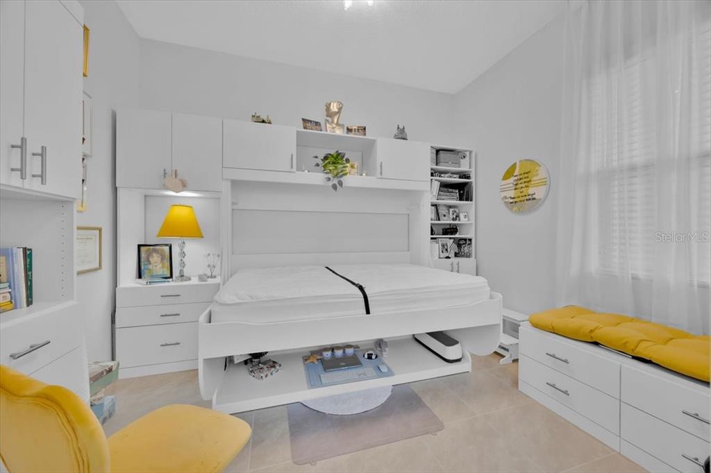 2031 Key Bay Trail Kissimmee, FL 34747 - Photo 22 of 46 a bathroom with a granite countertop sink and a bathtub