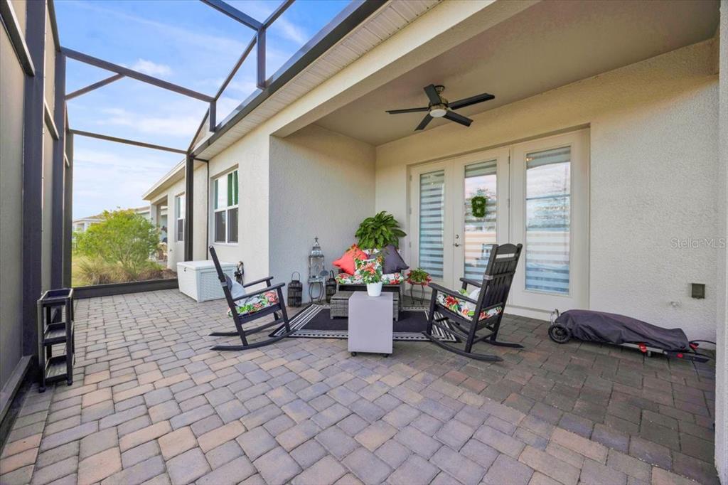 2031 Key Bay Trail Kissimmee, FL 34747 - Photo 25 of 46 a view of a workspace with furniture and a window