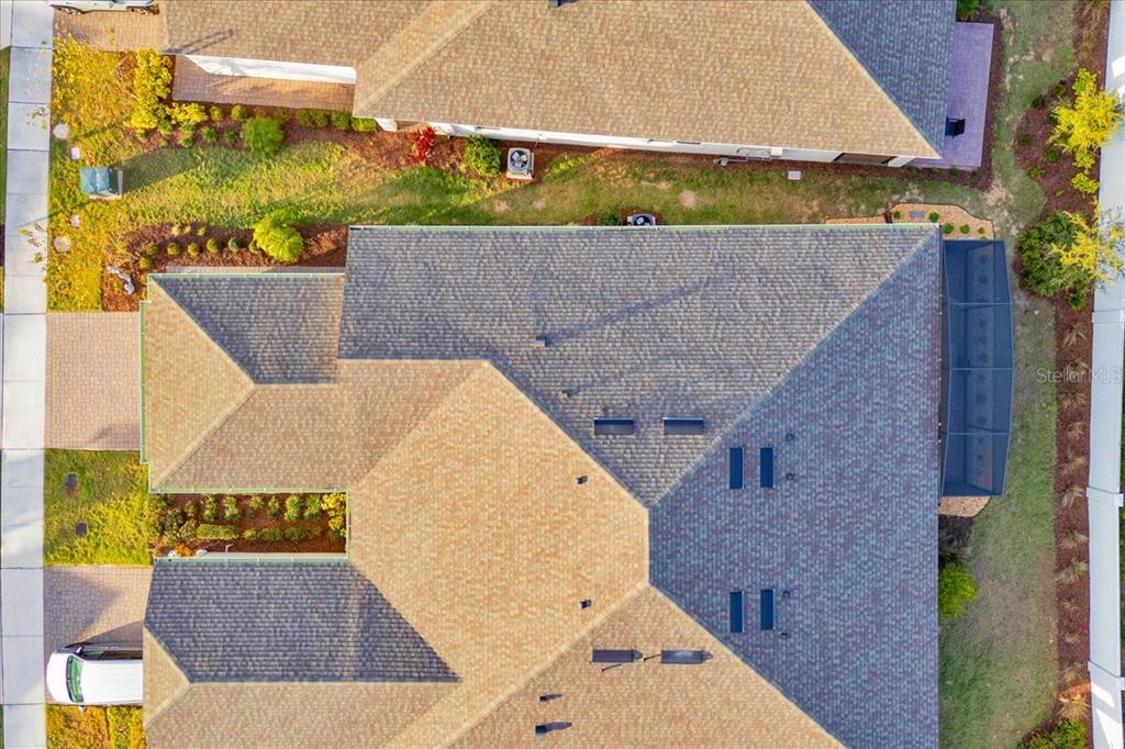 2031 Key Bay Trail Kissimmee, FL 34747 - Photo 30 of 46 an aerial view of a house with a yard and potted plants