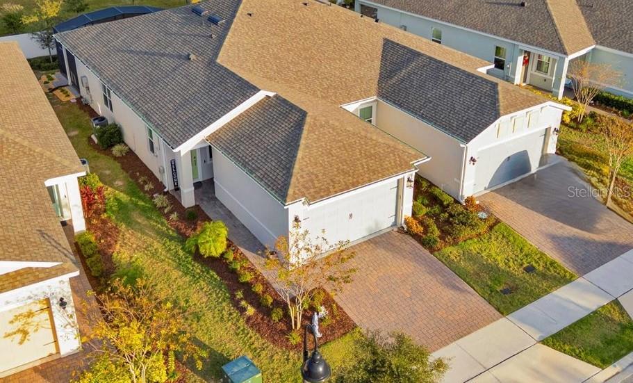 2031 Key Bay Trail Kissimmee, FL 34747 - Photo 3 of 46 front view of a house with a yard