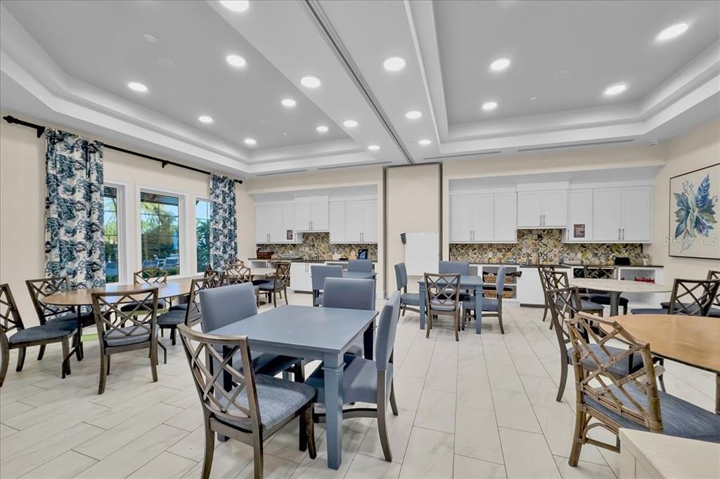 2031 Key Bay Trail Kissimmee, FL 34747 - Photo 38 of 46 a view of a dining room with furniture