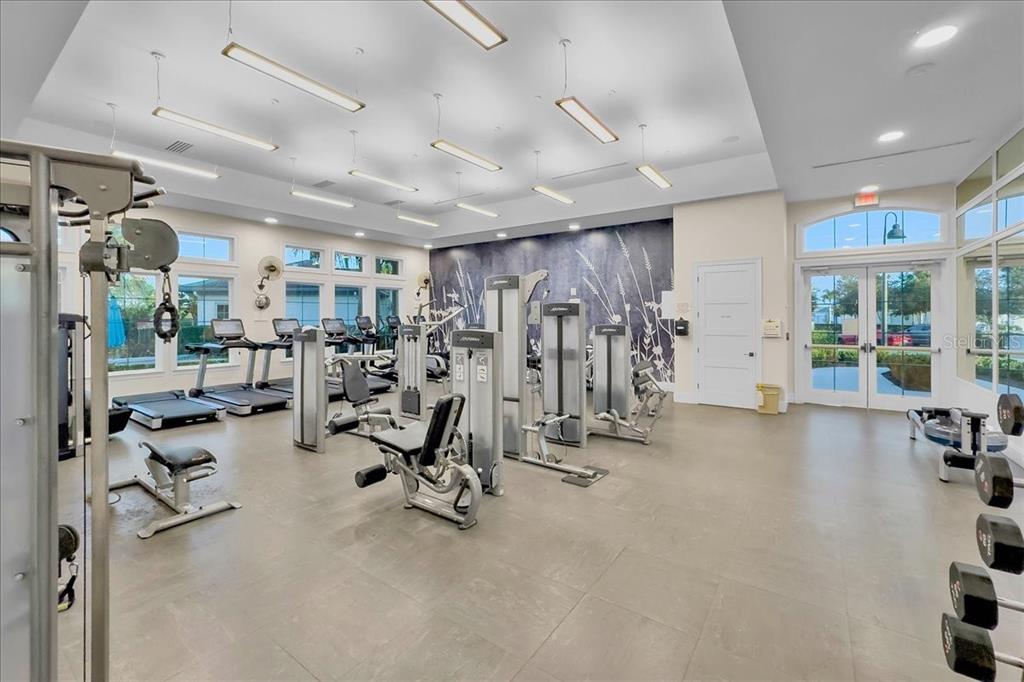 2031 Key Bay Trail Kissimmee, FL 34747 - Photo 39 of 46 a view of a room with gym equipment