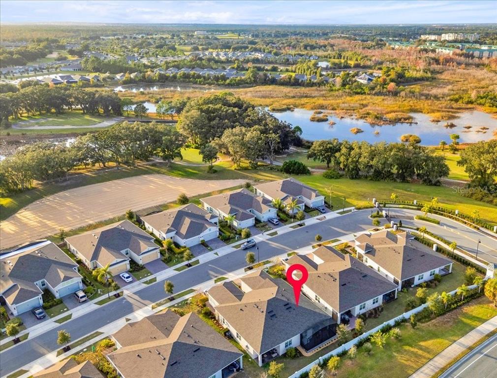 2031 Key Bay Trail Kissimmee, FL 34747 - Photo 46 of 46 an aerial view of residential houses with outdoor space and lake view