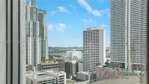 a view of a city with tall buildings