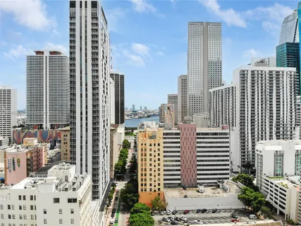 a view of a city with tall buildings