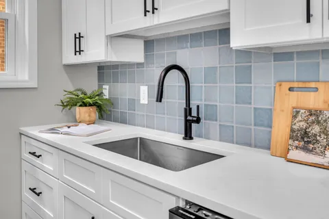 a bed room with a bed and a window