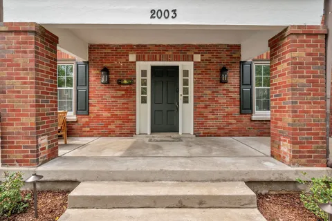 a front view of a building with windows