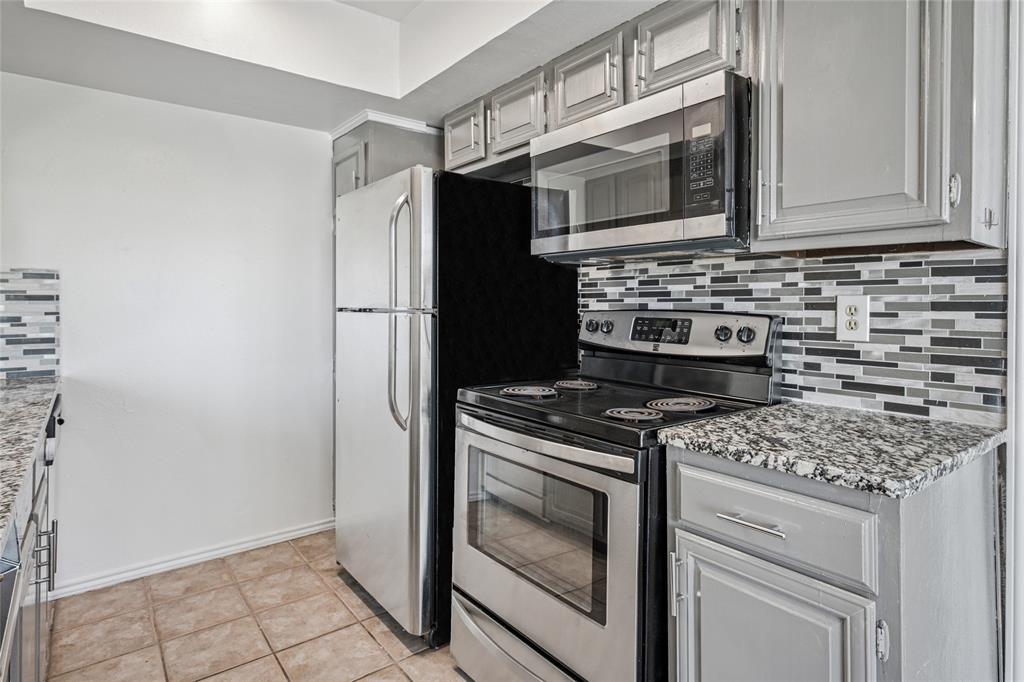 4472 Chaha Road, Unit 103 Garland, TX 75043 - Photo 7 of 16 Refrigerator stays