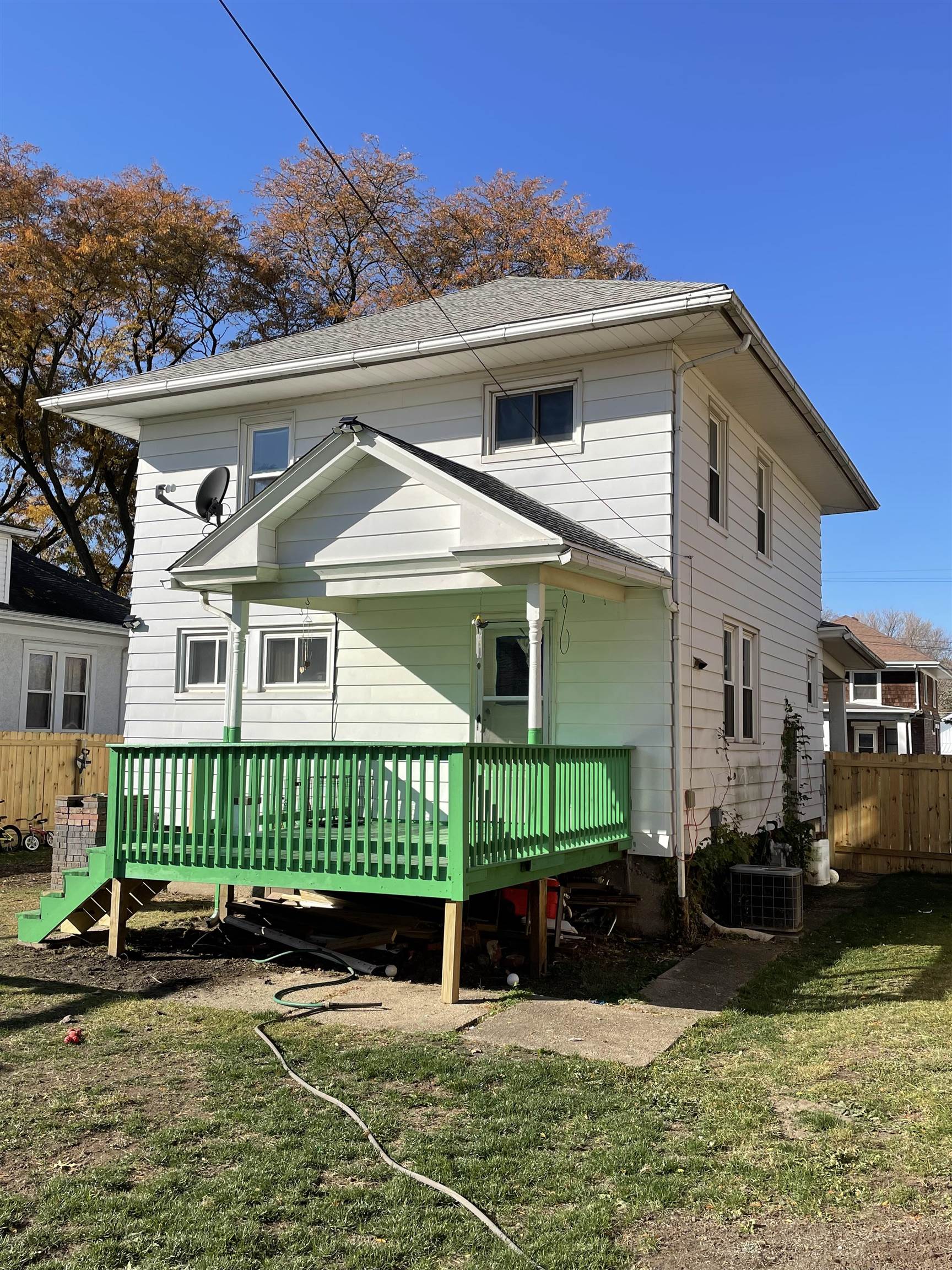 425 North Main Street Stockton, IL 61085 - Photo 2 of 20 a front view of a house with a yard